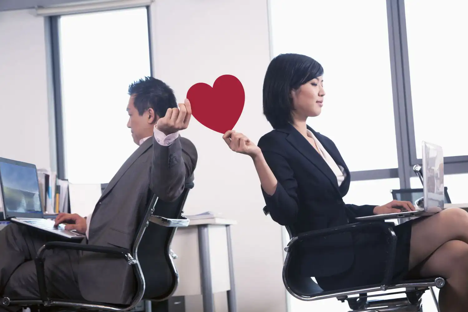 What Should an Employee Handbook Say (or not say) About Office Romance